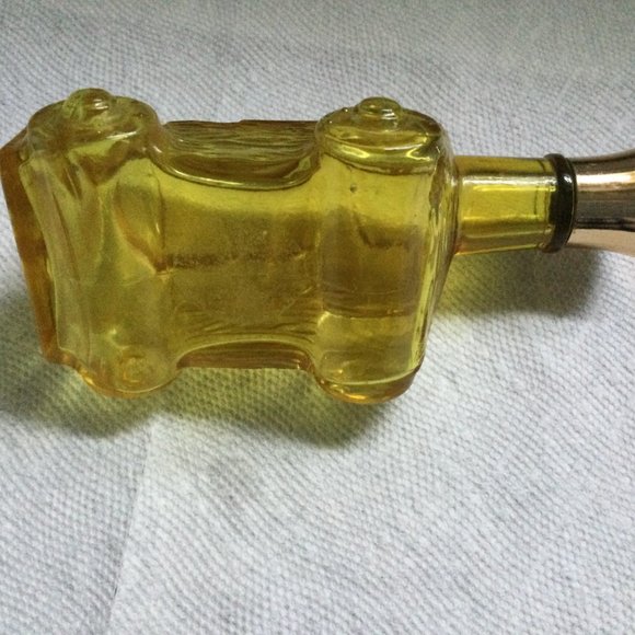 Glass bottle empty yellow amber cannon shape AVON? - Picture 5 of 5